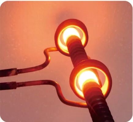 थर्मल प्रोसेसिंग के लिए डिज़ाइन की गई स्प्लिट कोर टाइप इंडक्टर इंडक्शन हीटिंग मशीन 50000 घंटे से अधिक का जीवनकाल प्रदान करती है